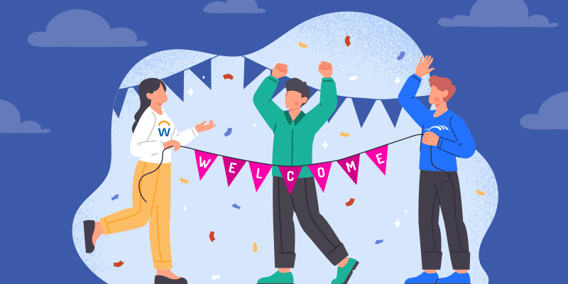 Three people celebrate IT onboarding with BetterCloud, standing under a colorful "Welcome" banner amid falling confetti; one waves enthusiastically, another raises their arms in excitement, and the third holds up the banner, all smiling to convey a festive and inclusive atmosphere.