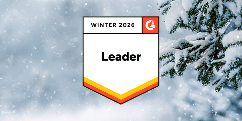 Leader badge for Winter 2026 from G2 reports set against snowy tree branches, celebrating BetterCloud's accomplishments.